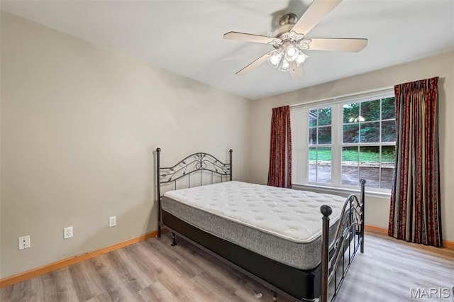 2518 Nike Base Rd, Catawissa, MO 63015 - bedroom featuring light wood-style flooring and ceiling fan