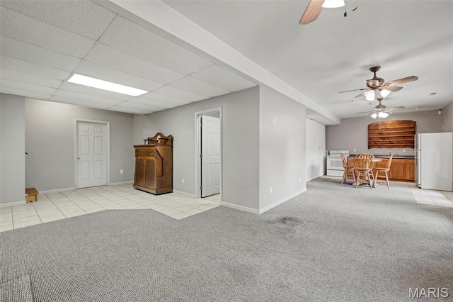 2518 Nike Base Rd, Catawissa, MO 63015 - living room with a ceiling fan, light colored carpet, and light tile patterned floors