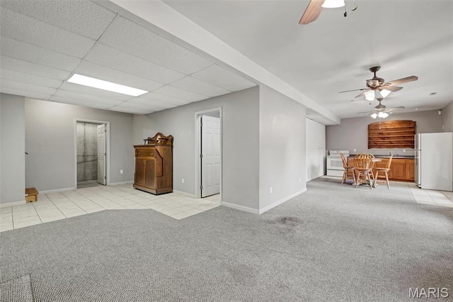 2518 Nike Base Rd, Catawissa, MO 63015 - living room with a ceiling fan, light colored carpet, and light tile patterned flooring