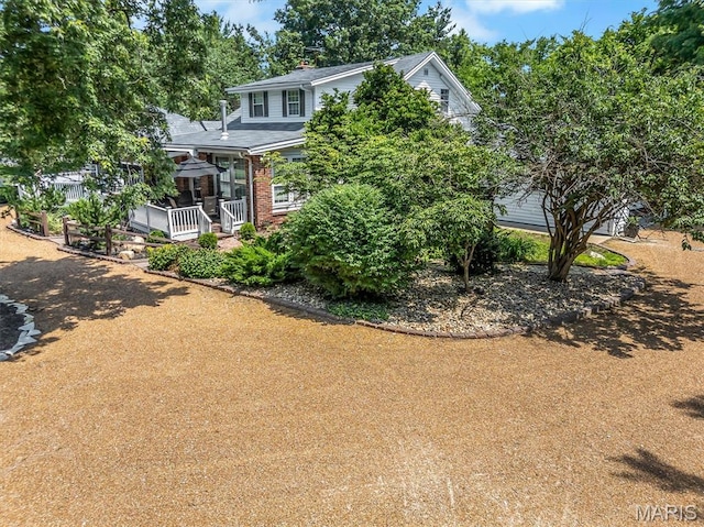 2466 State Road Ff, Eureka, MO 63025 - view of property hidden behind natural elements with brick siding