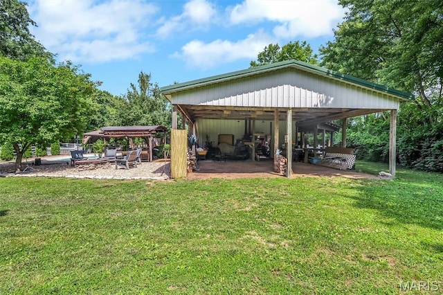 2466 State Road Ff, Eureka, MO 63025 - exterior space featuring a lawn, a patio area, a detached carport, and a gazebo