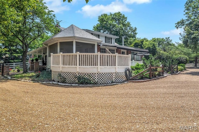 2466 State Road Ff, Eureka, MO 63025 - rear view of house featuring a sunroom