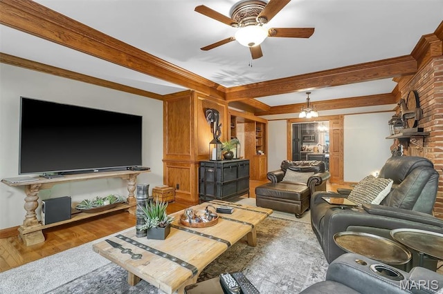 2466 State Road Ff, Eureka, MO 63025 - living room featuring a ceiling fan, wood finished floors, and crown molding