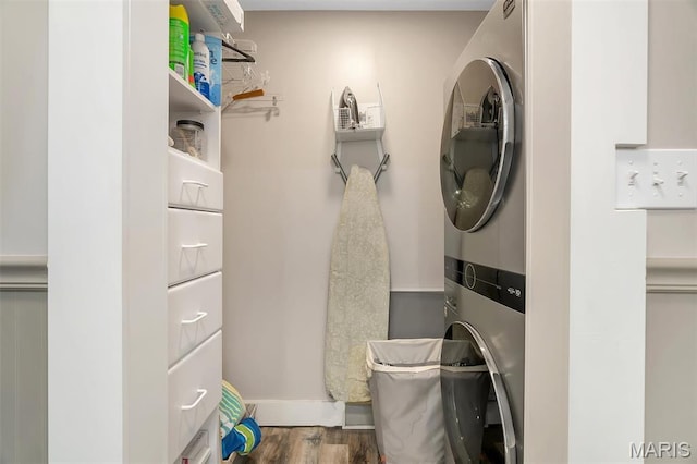 2466 State Road Ff, Eureka, MO 63025 - washroom featuring stacked washer and clothes dryer and wood finished floors