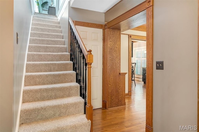 2466 State Road Ff, Eureka, MO 63025 - staircase featuring wood finished floors and baseboards