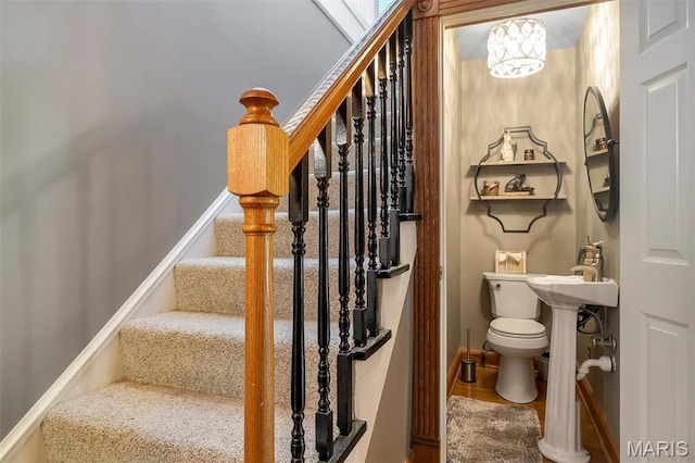 2466 State Road Ff, Eureka, MO 63025 - stairs featuring baseboards and wood finished floors