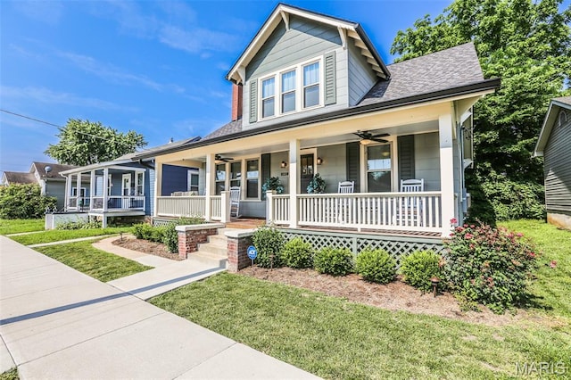 201 S Columbus St, Pacific, MO 63069 - view of front of home with a porch, ceiling fan, and a shingled roof