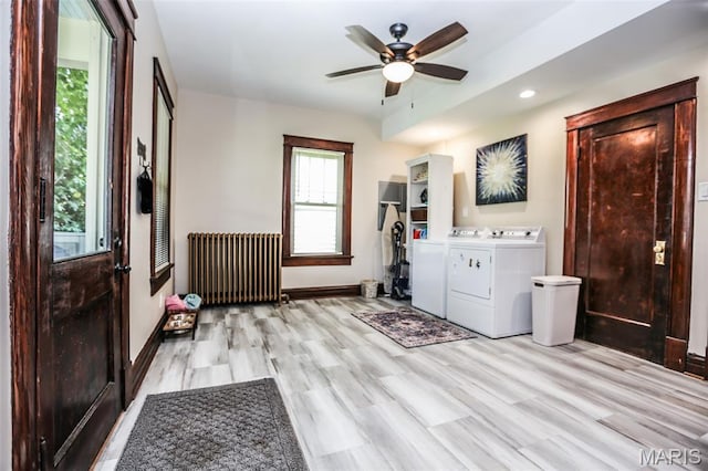 201 S Columbus St, Pacific, MO 63069 - laundry room with radiator heating unit, washer and clothes dryer, a ceiling fan, light wood-style flooring, and recessed lighting