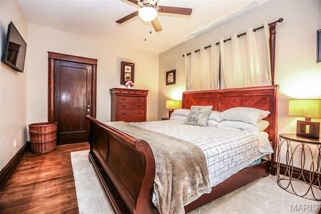 201 S Columbus St, Pacific, MO 63069 - bedroom with wood finished floors and a ceiling fan