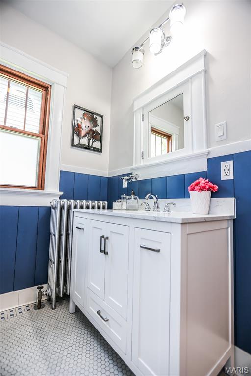 201 S Columbus St, Pacific, MO 63069 - bathroom with vanity and tile patterned floors