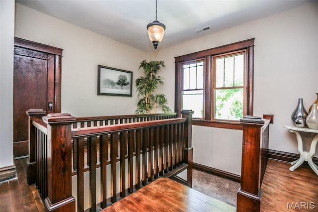 201 S Columbus St, Pacific, MO 63069 - stairway featuring wood finished floors and baseboards