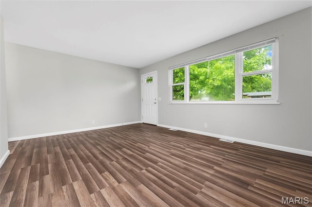 2185 Orleans Ln, Florissant, MO 63031 - unfurnished room featuring baseboards and wood finished floors