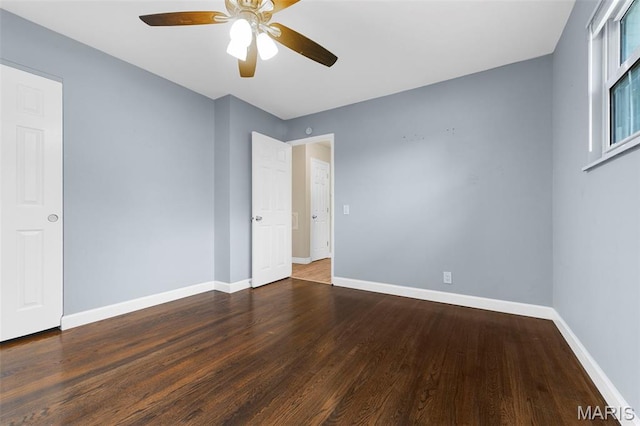 2185 Orleans Ln, Florissant, MO 63031 - spare room with wood finished floors and a ceiling fan