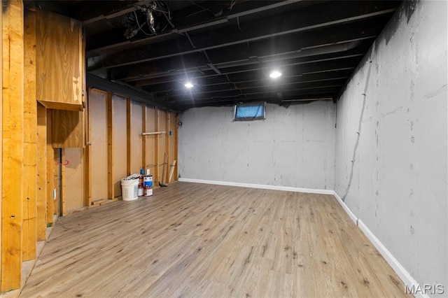 2185 Orleans Ln, Florissant, MO 63031 - unfinished below grade area with light wood-style floors