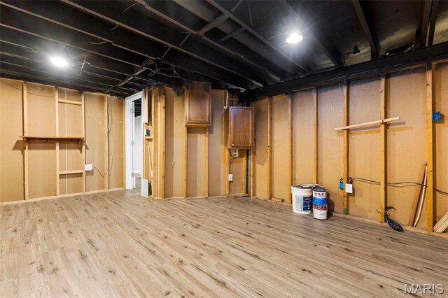 2185 Orleans Ln, Florissant, MO 63031 - unfinished basement featuring wood finished floors