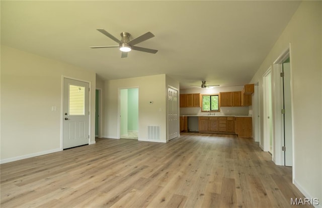 201 W 5th St, Grandin, MO 63943 - unfurnished living room with ceiling fan and light wood-style flooring