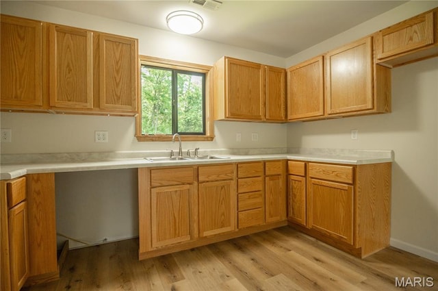 201 W 5th St, Grandin, MO 63943 - kitchen with light wood-style flooring and light countertops