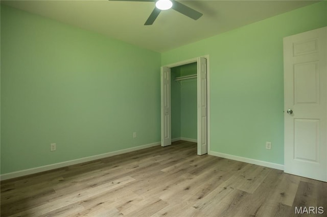 201 W 5th St, Grandin, MO 63943 - unfurnished bedroom featuring light wood-style floors, a closet, and ceiling fan