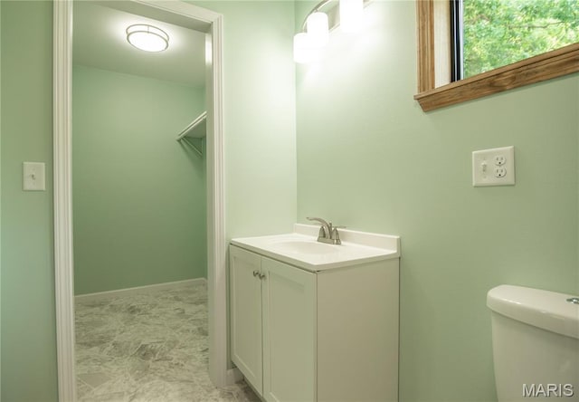 201 W 5th St, Grandin, MO 63943 - bathroom featuring toilet and vanity