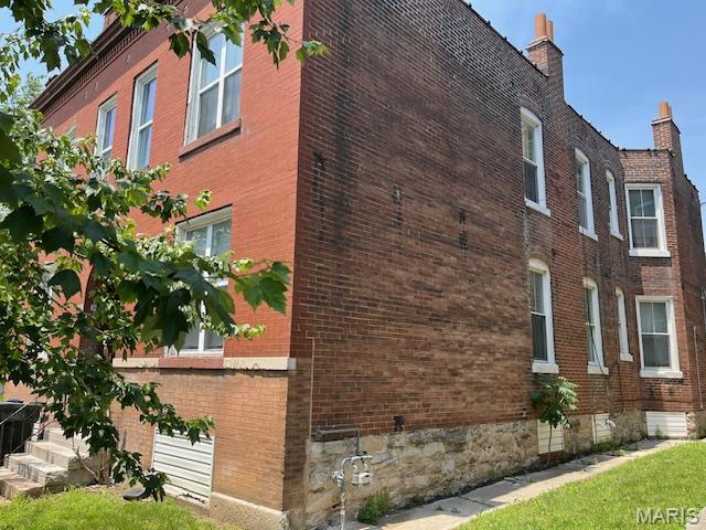 2923 Miami, Saint Louis, MO 63118 - view of side of home featuring brick siding