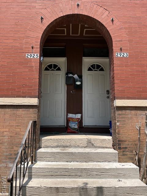 2923 Miami, Saint Louis, MO 63118 - doorway to property featuring brick siding