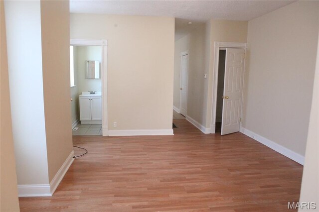 2923 Miami, Saint Louis, MO 63118 - unfurnished room featuring light wood finished floors