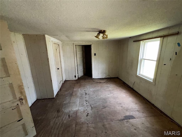 2205 N 5th St, Saint Charles, MO 63301 - empty room with a textured ceiling