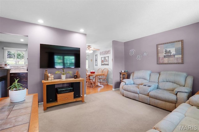 1809 Partridge Dr, Windsor Township, MO 63052 - living room with light colored carpet, a ceiling fan, and recessed lighting