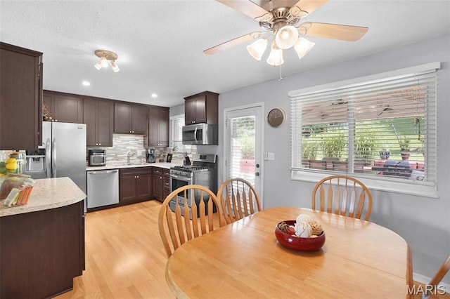 1809 Partridge Dr, Windsor Township, MO 63052 - dining space with light wood-style floors, a ceiling fan, and recessed lighting