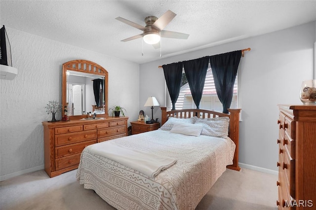 1809 Partridge Dr, Windsor Township, MO 63052 - bedroom featuring light colored carpet, a textured ceiling, a textured wall, and ceiling fan