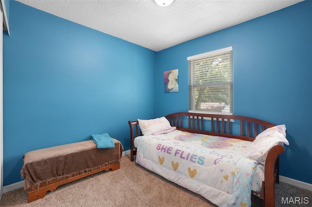 1809 Partridge Dr, Windsor Township, MO 63052 - carpeted bedroom featuring baseboards and a textured ceiling