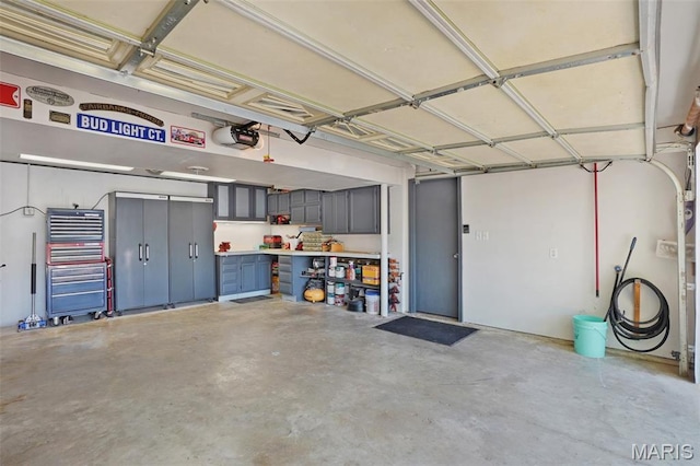 1809 Partridge Dr, Windsor Township, MO 63052 - garage featuring a garage door opener