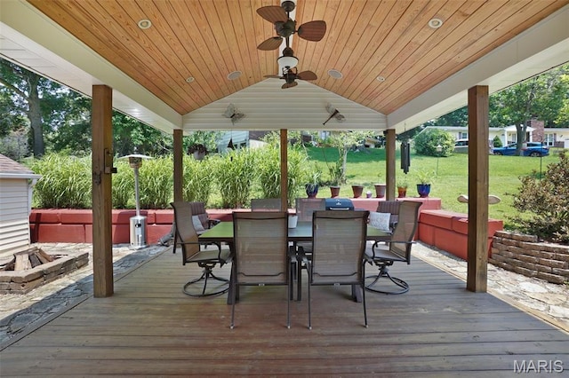 1809 Partridge Dr, Windsor Township, MO 63052 - wooden terrace featuring ceiling fan, a lawn, and outdoor dining space