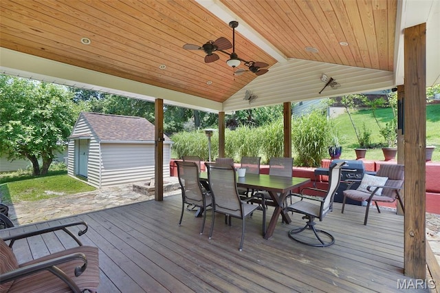 1809 Partridge Dr, Windsor Township, MO 63052 - wooden deck featuring outdoor dining area, ceiling fan, and a storage shed