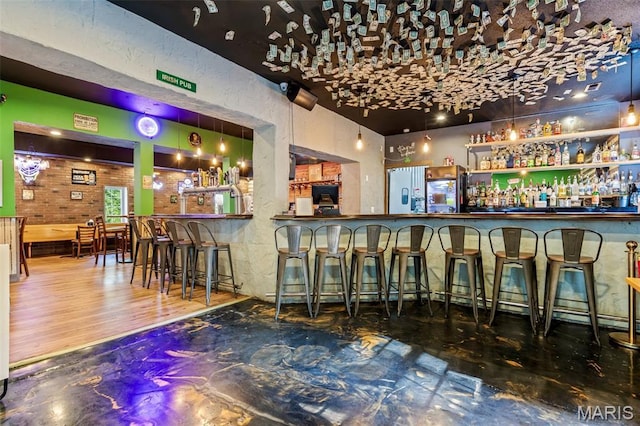 201 Houser St, Park Hills, MO 63601 - indoor dry bar featuring refrigerator with ice dispenser