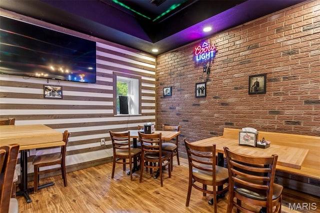 201 Houser St, Park Hills, MO 63601 - dining area with wood finished floors and brick wall
