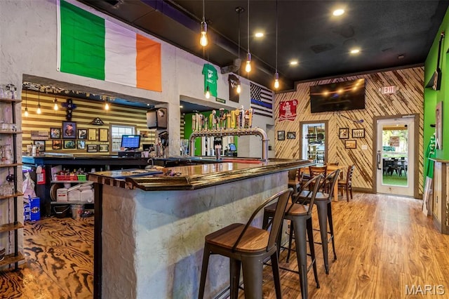 201 Houser St, Park Hills, MO 63601 - bar area featuring wood finished floors, wood walls, pendant lighting, and recessed lighting