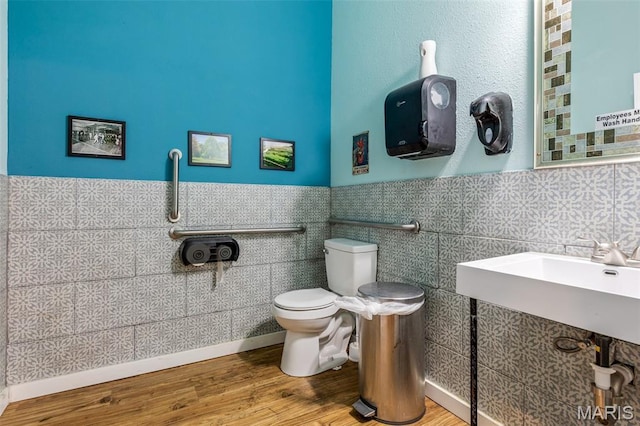 201 Houser St, Park Hills, MO 63601 - half bathroom with pet washing station, tile walls, wood finished floors, and wainscoting