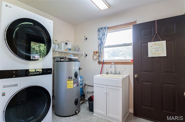 10201 County Road 5440, Rolla, MO 65401 - laundry room with stacked washing machine and dryer, water heater, cabinet space, and a textured ceiling