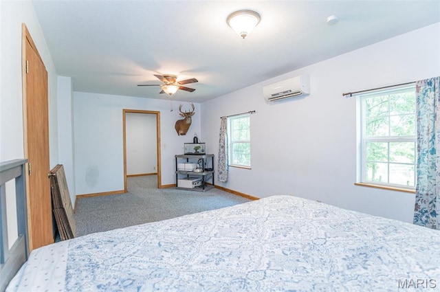 10201 County Road 5440, Rolla, MO 65401 - carpeted bedroom with a wall mounted air conditioner and a ceiling fan