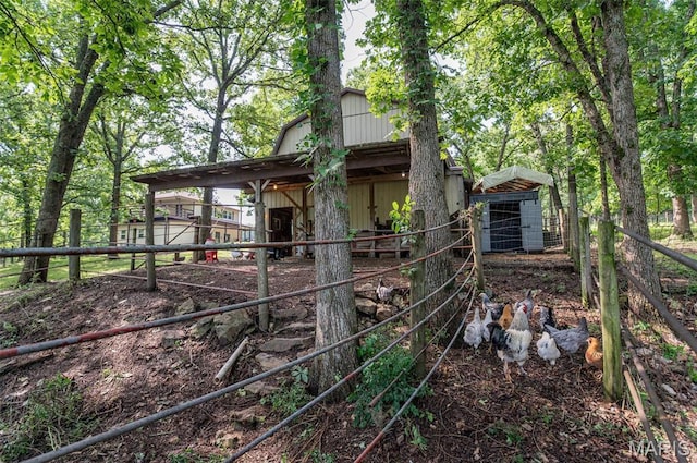 10201 County Road 5440, Rolla, MO 65401 - view of property exterior with an exterior structure and an outdoor structure