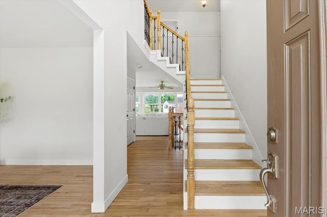 4507 Behlmann Grove Pl, Florissant, MO 63034 - stairway with wood finished floors and baseboards