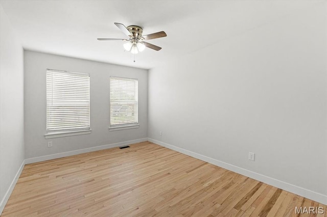 4507 Behlmann Grove Pl, Florissant, MO 63034 - unfurnished room with a ceiling fan and light wood-style floors