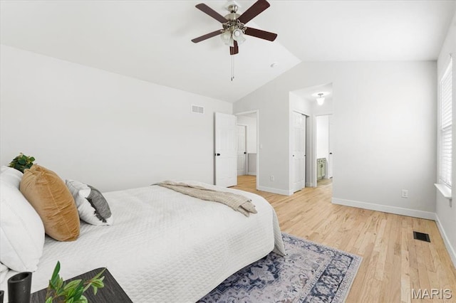 4507 Behlmann Grove Pl, Florissant, MO 63034 - bedroom featuring lofted ceiling, light wood-style floors, and ceiling fan