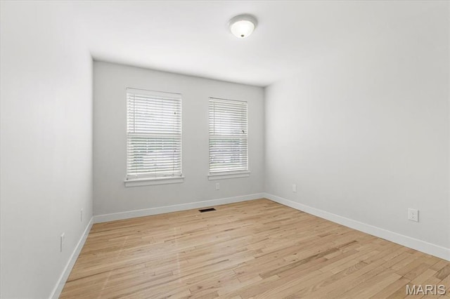 4507 Behlmann Grove Pl, Florissant, MO 63034 - empty room featuring light wood finished floors and baseboards