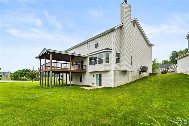 4507 Behlmann Grove Pl, Florissant, MO 63034 - back of property featuring a yard, a chimney, and a wooden deck