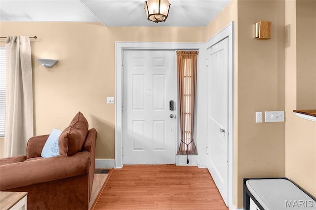 900 Danforth St, Alton, IL 62002 - foyer entrance with light wood finished floors and baseboards