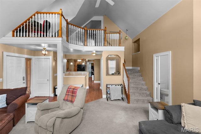 900 Danforth St, Alton, IL 62002 - living room featuring a ceiling fan, high vaulted ceiling, stairs, and carpet