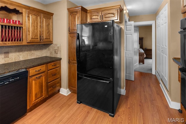 900 Danforth St, Alton, IL 62002 - kitchen with black appliances, light wood-style flooring, and brown cabinetry