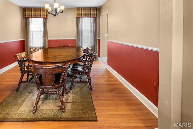 900 Danforth St, Alton, IL 62002 - dining space with plenty of natural light, a chandelier, and wood finished floors